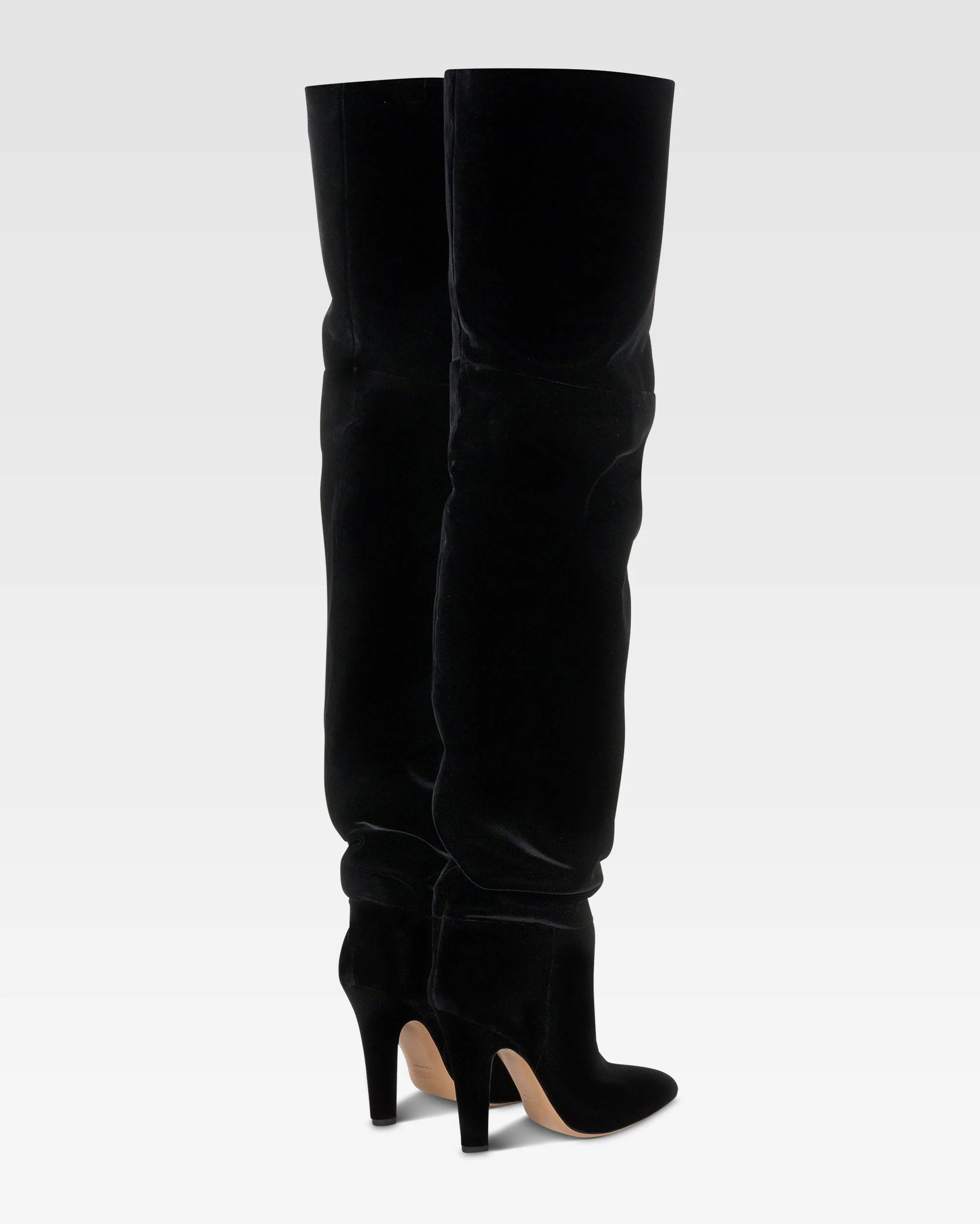 Over-the-knee boots in black velvet. 3 Over-the-knee boots in black velvet.