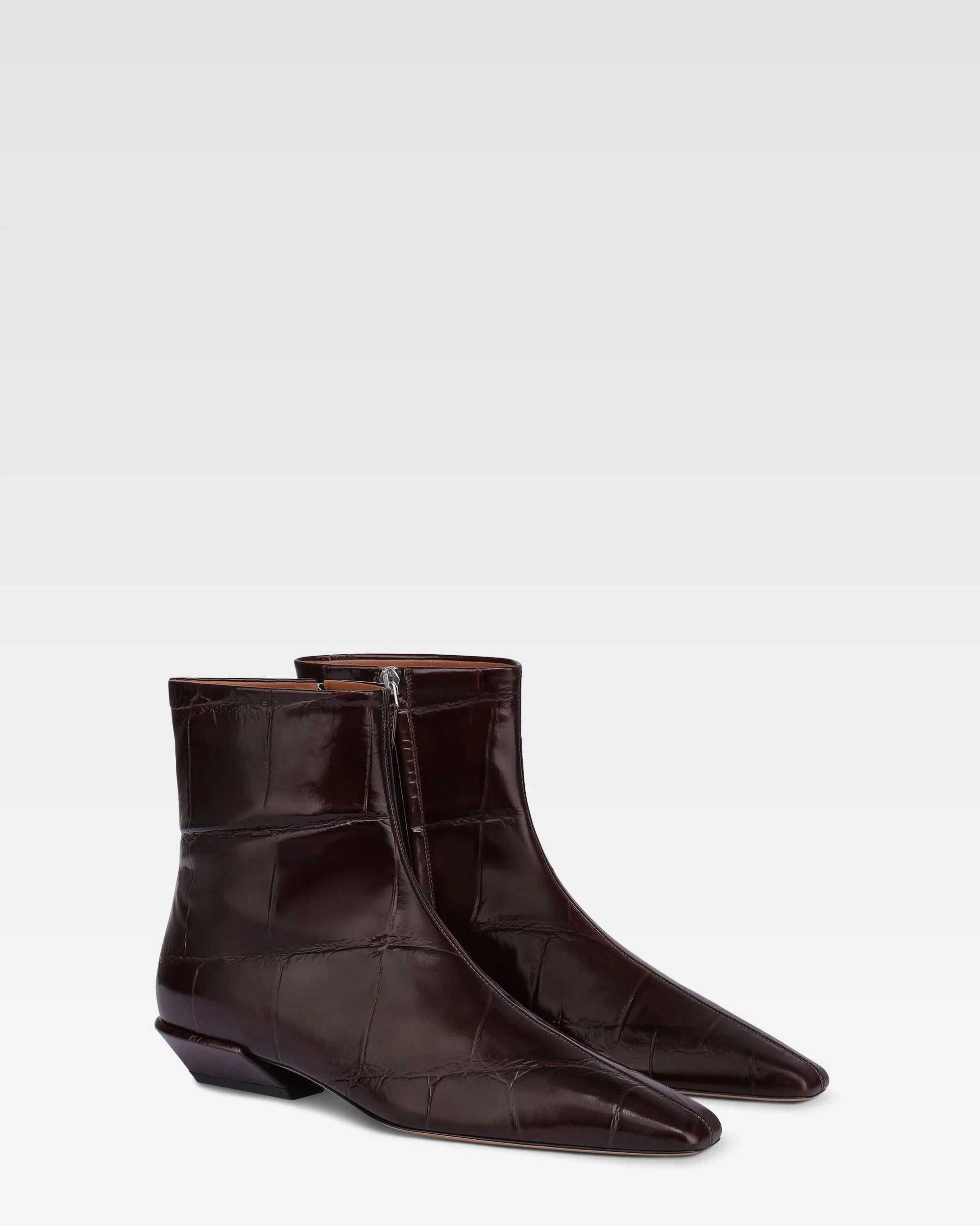 Ankle boots in rouge noir croco-embossed leather