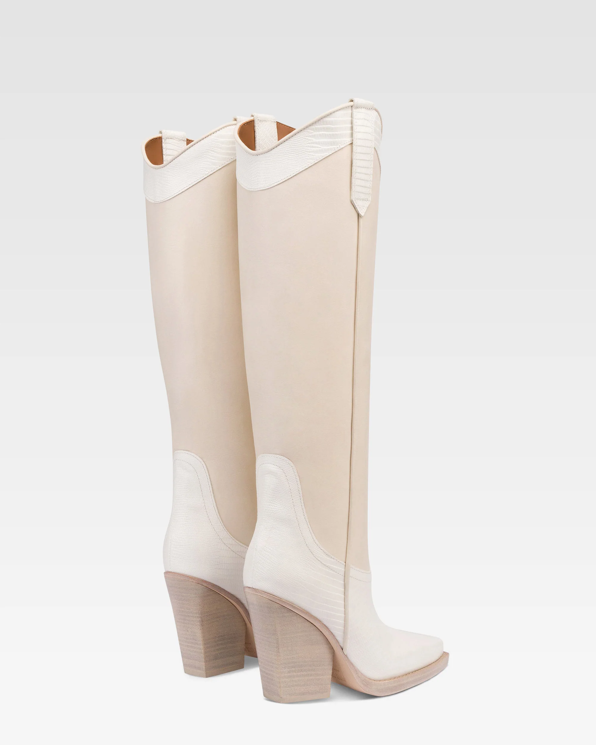 Boots in lizard-print and white leather