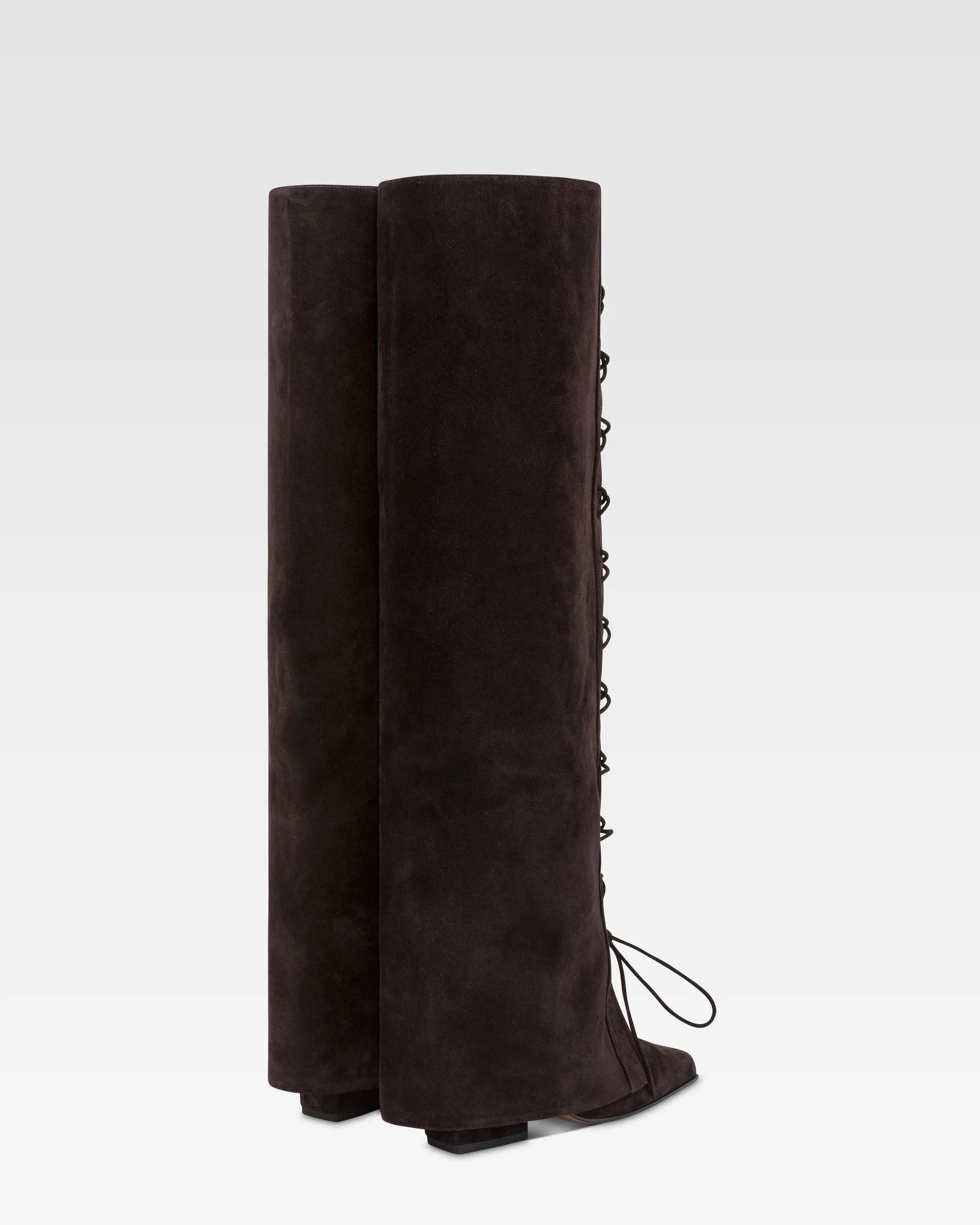 Fold-over boots in ebony calf suede. 3 Fold-over boots in ebony calf suede.