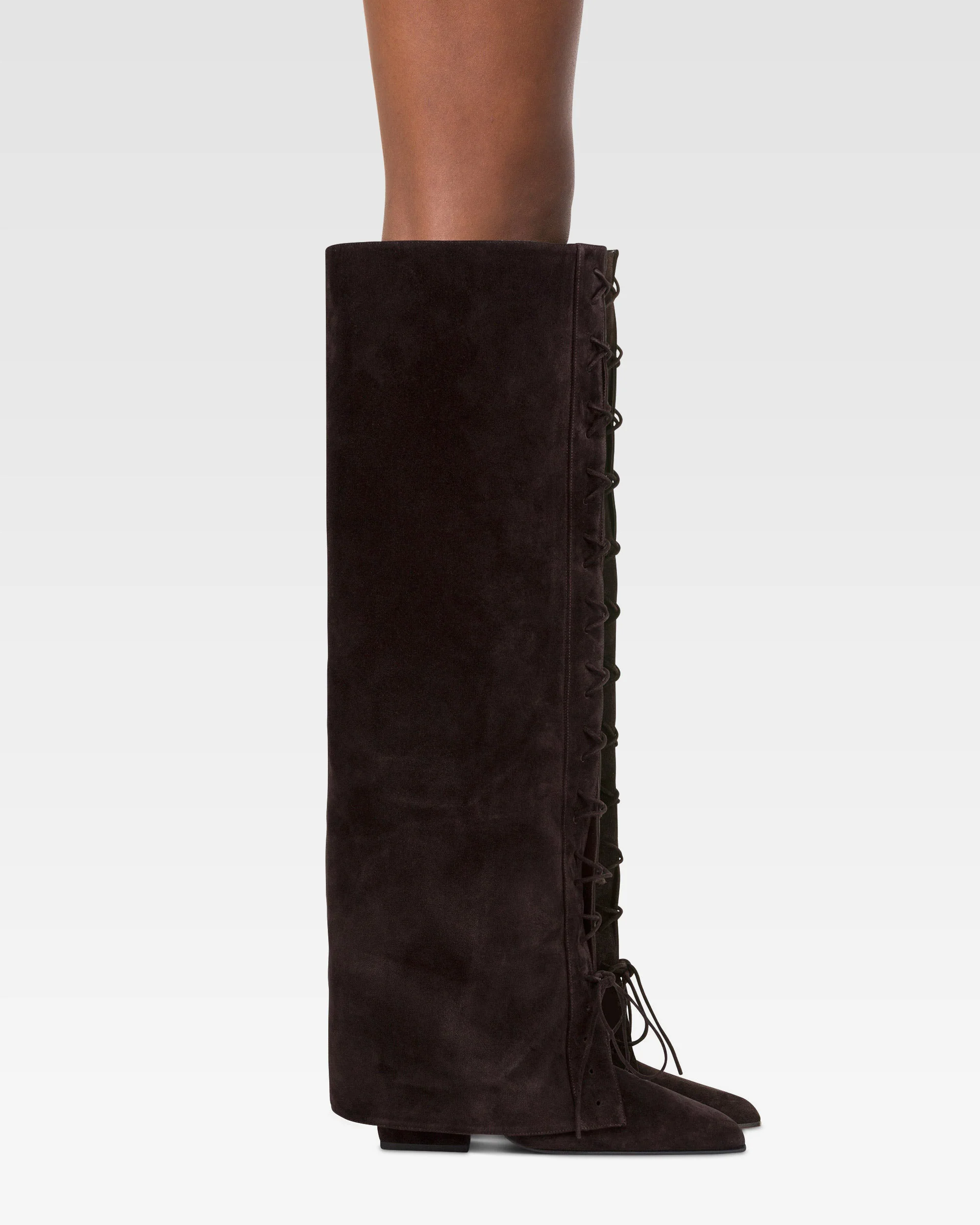 Fold-over boots in ebony calf suede. 6 Fold-over boots in ebony calf suede.