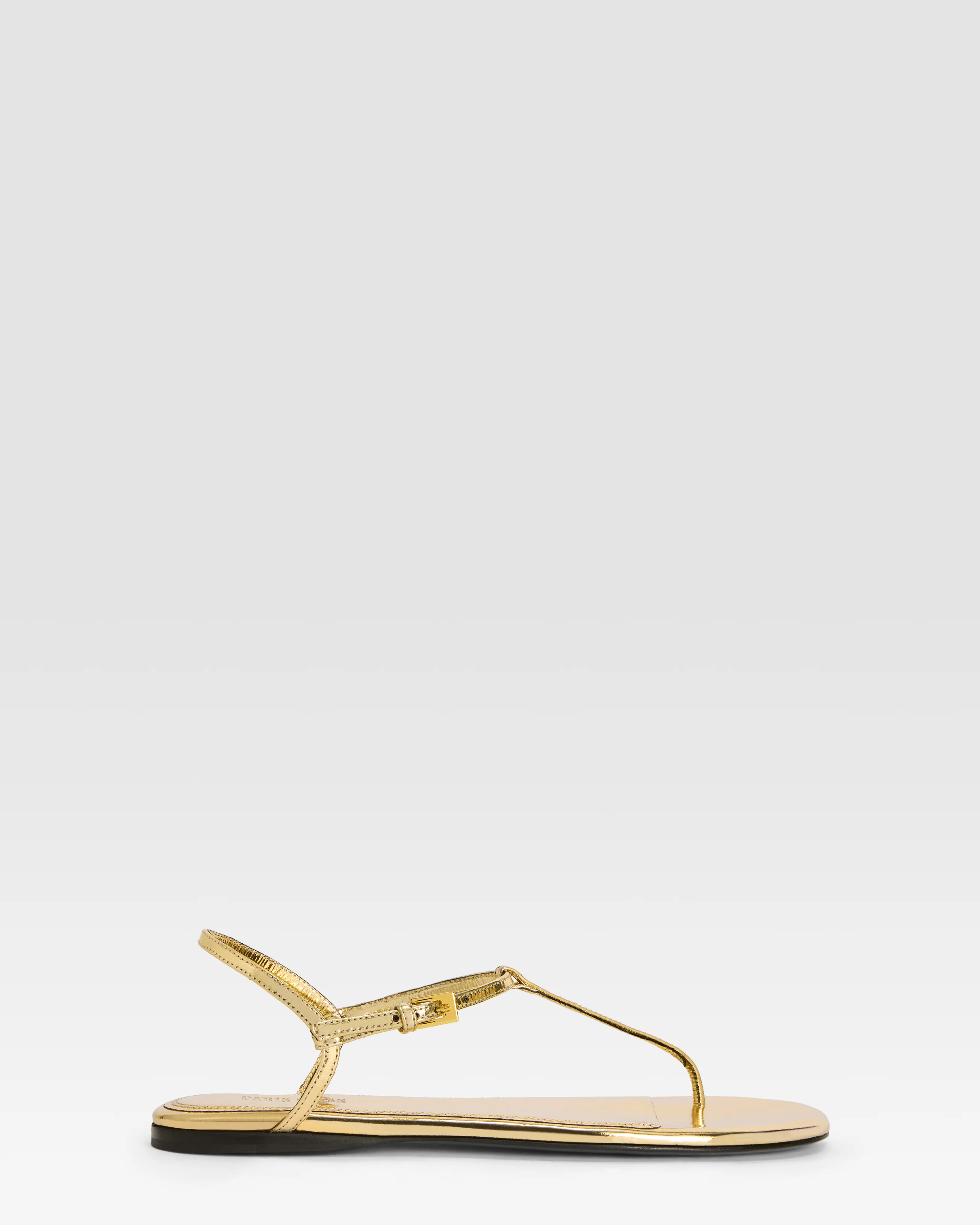 Flat sandals in gold metallic-effect, plisse leather