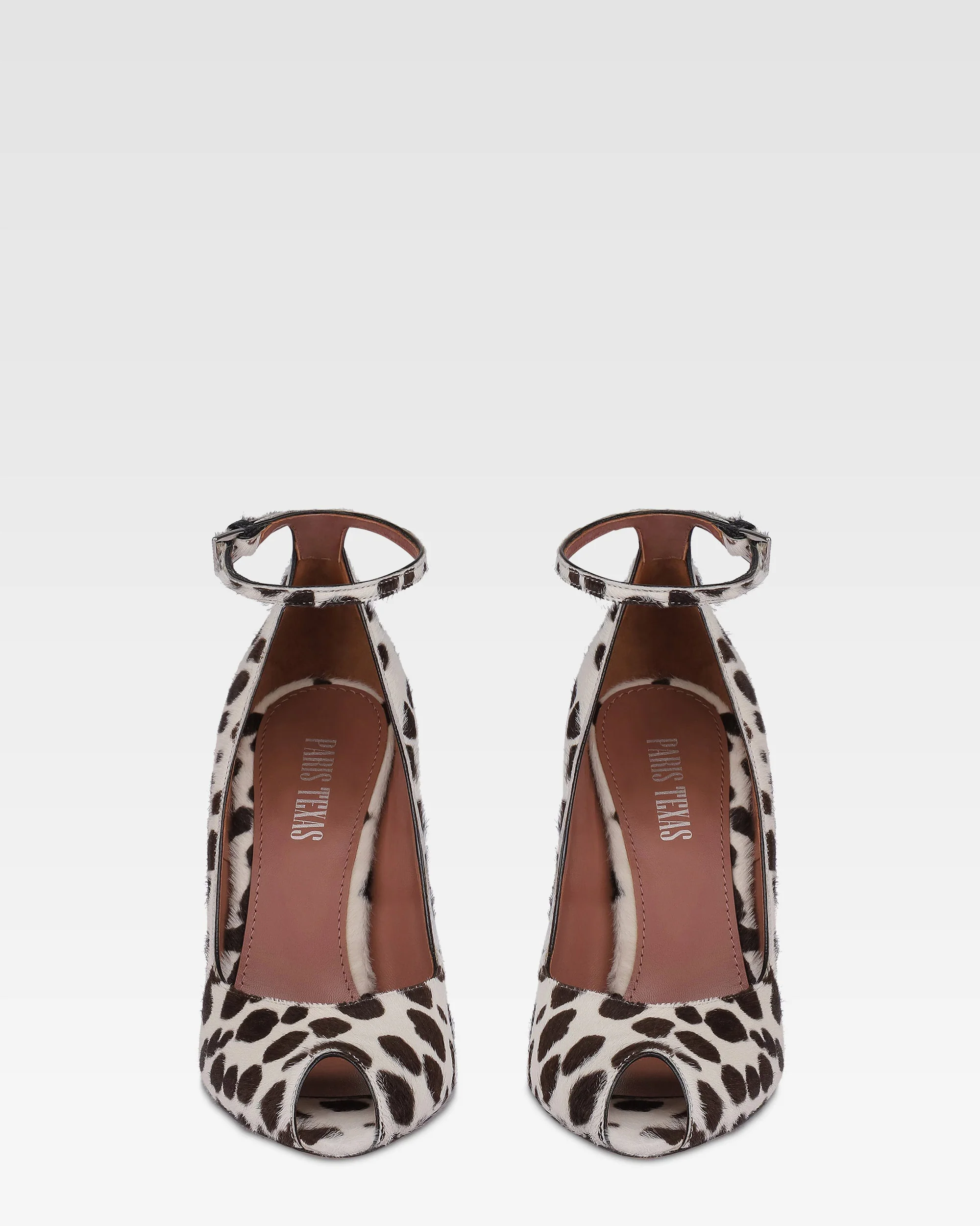 Pumps in white and dark brown printed cowhide