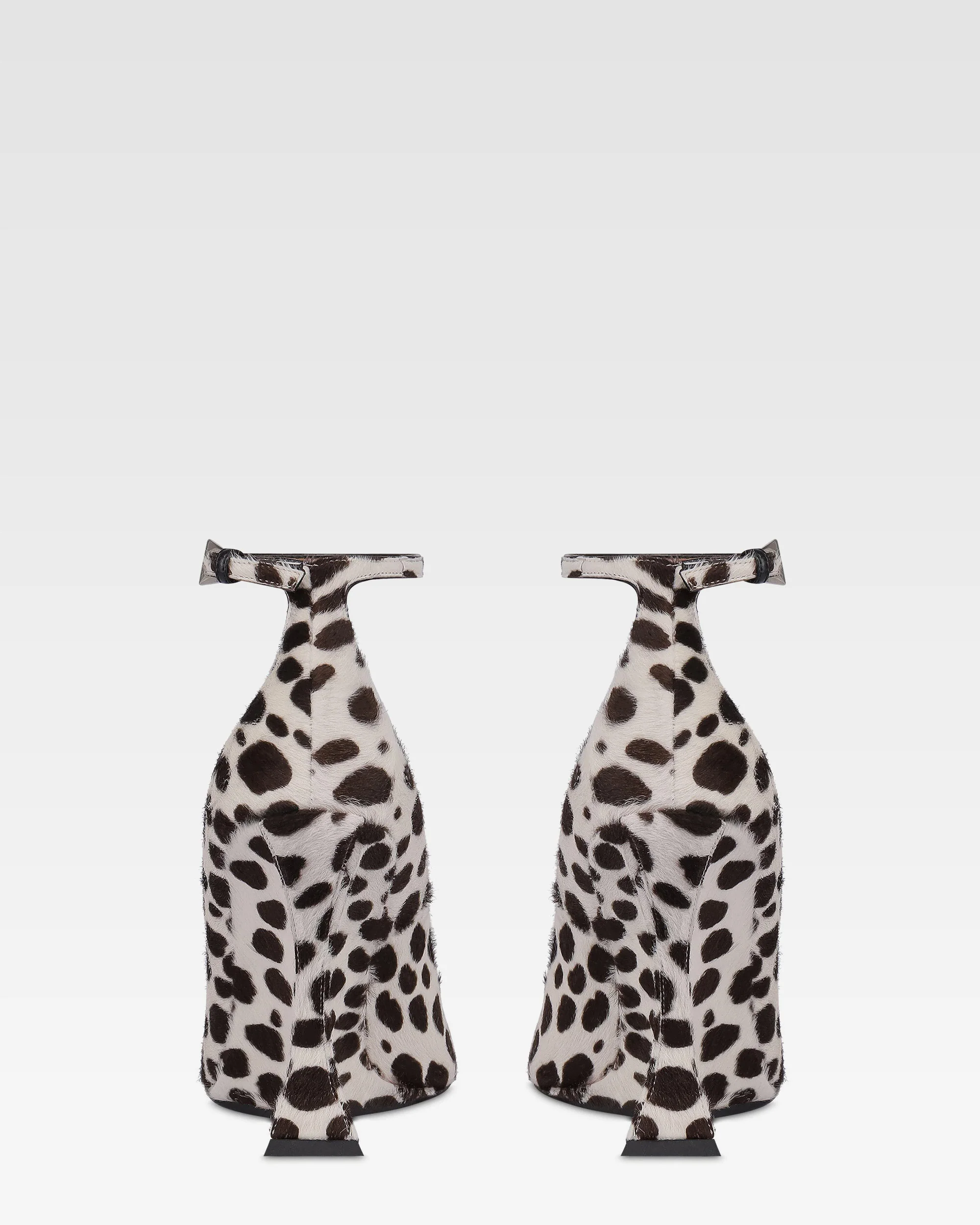 Pumps in white and dark brown printed cowhide