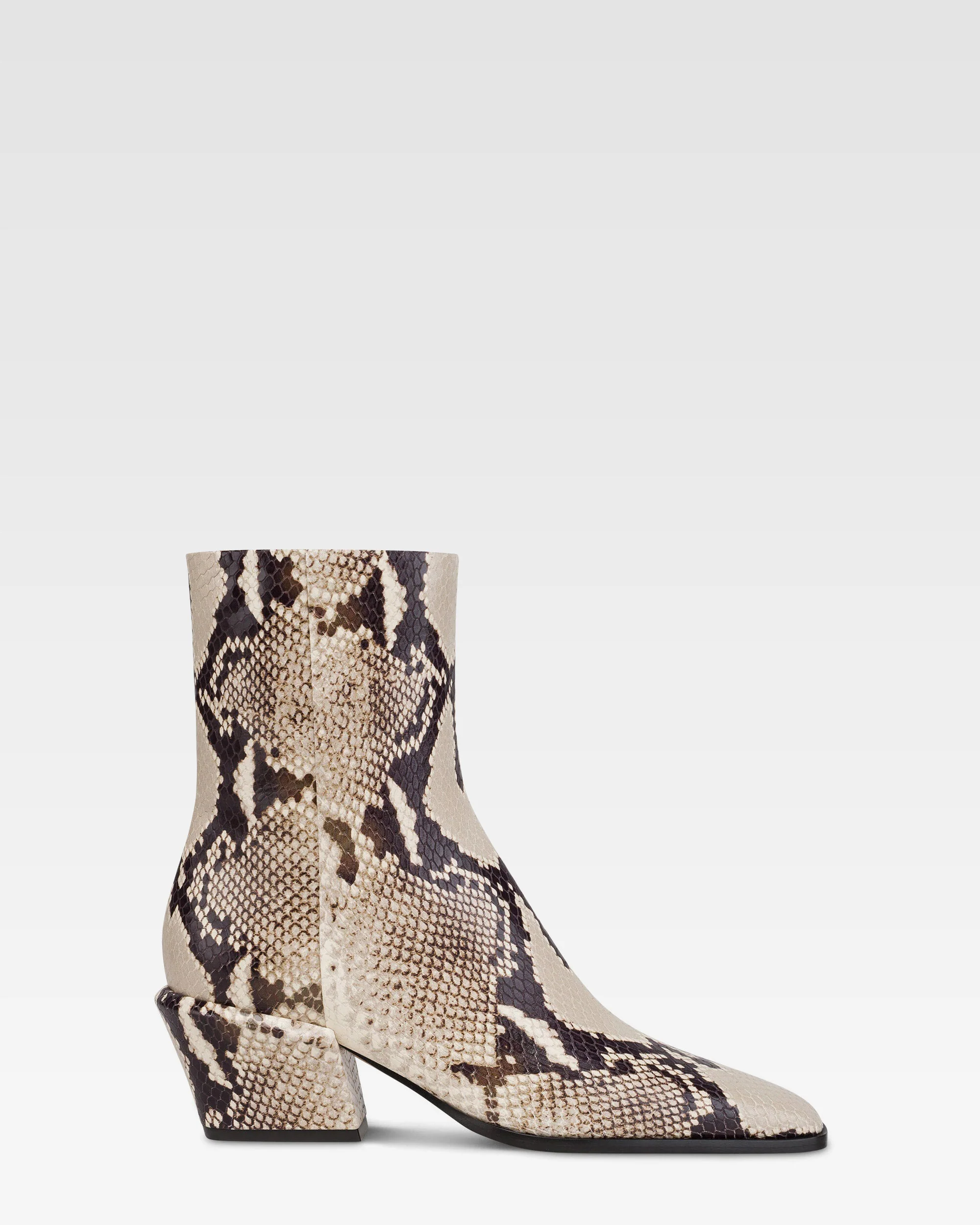 Ankle boots in natural printed python leather.