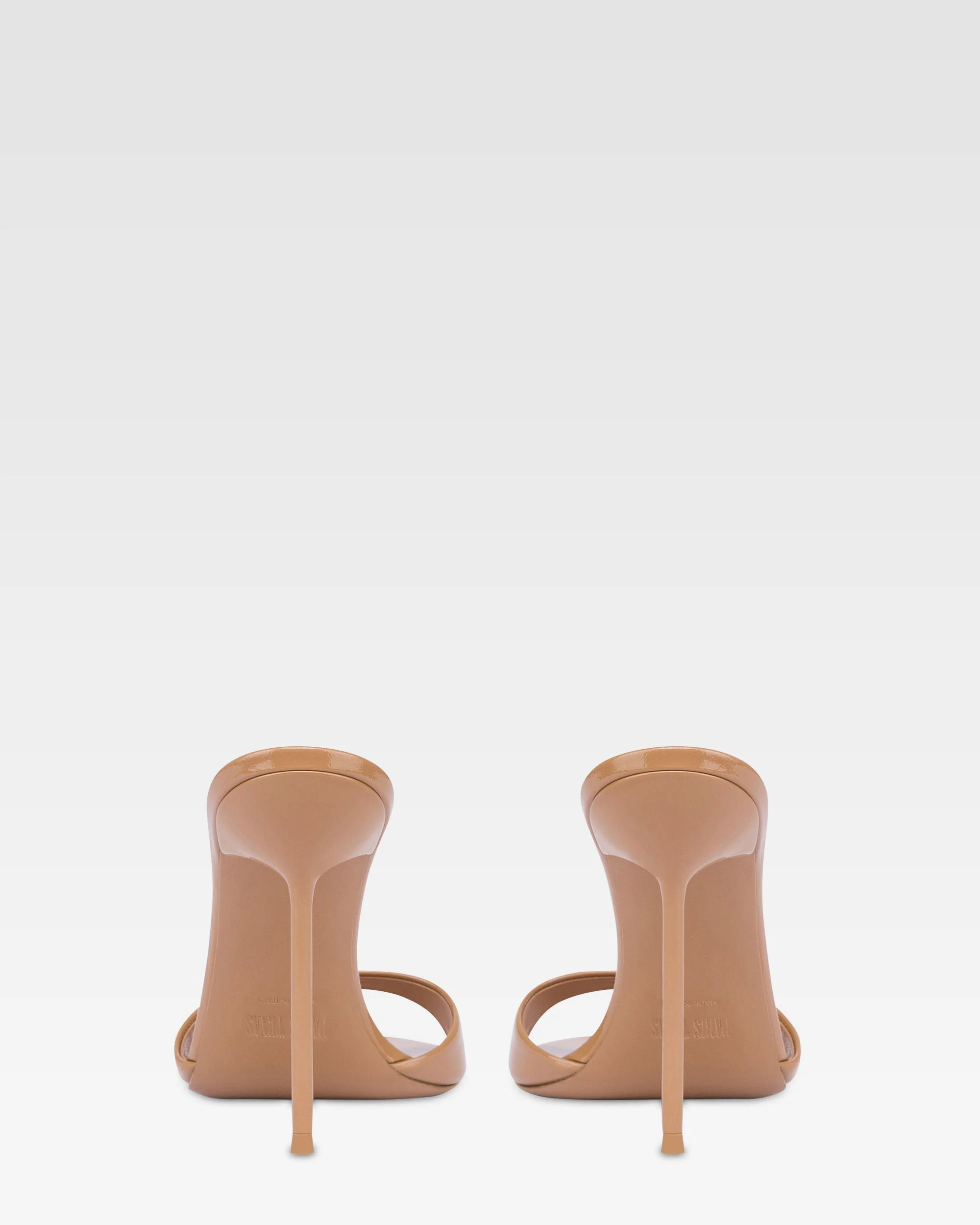 Almond-toe mules in patent caramel leather