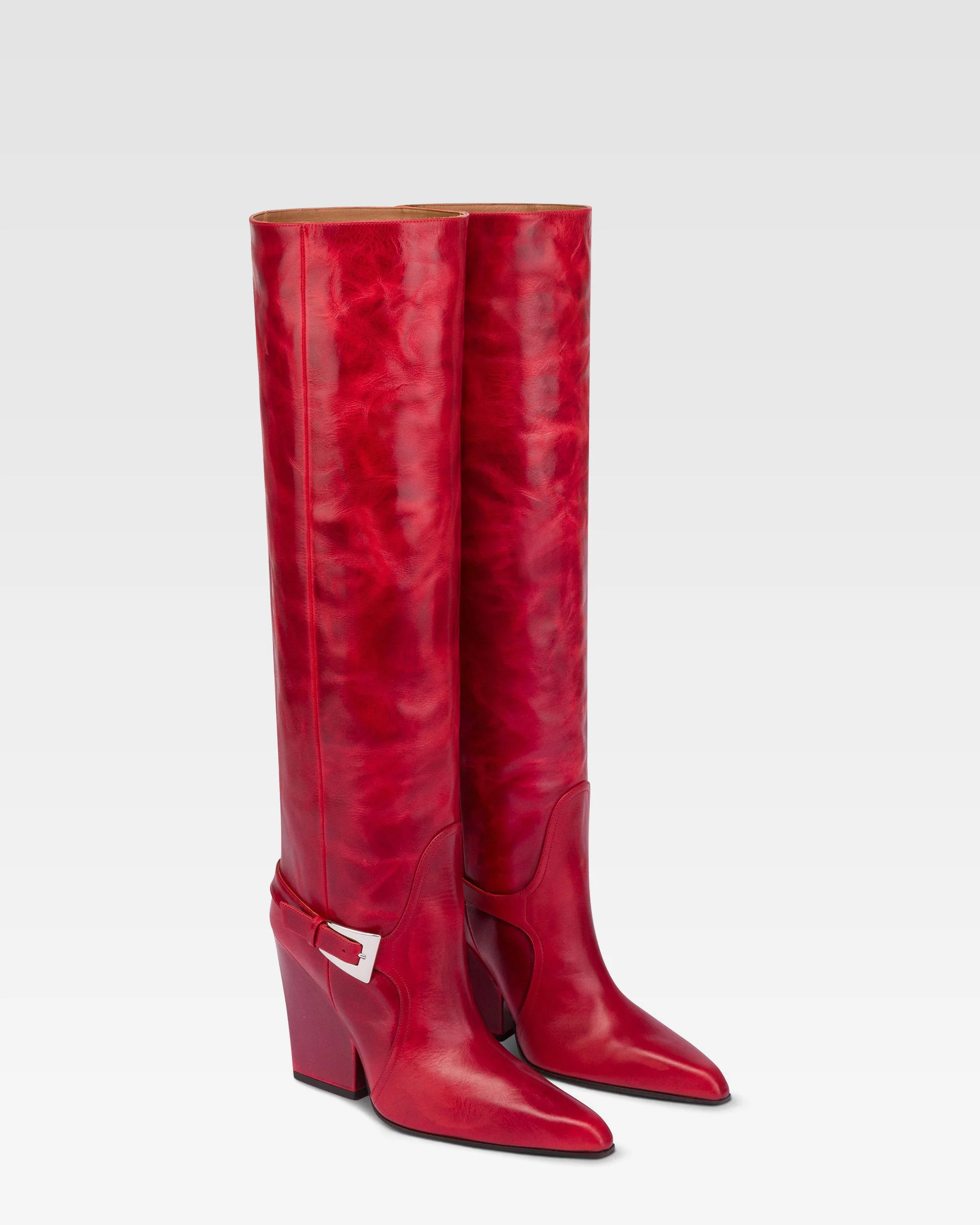 Tall, knee-high boots in shiny fiesta vintage leather
