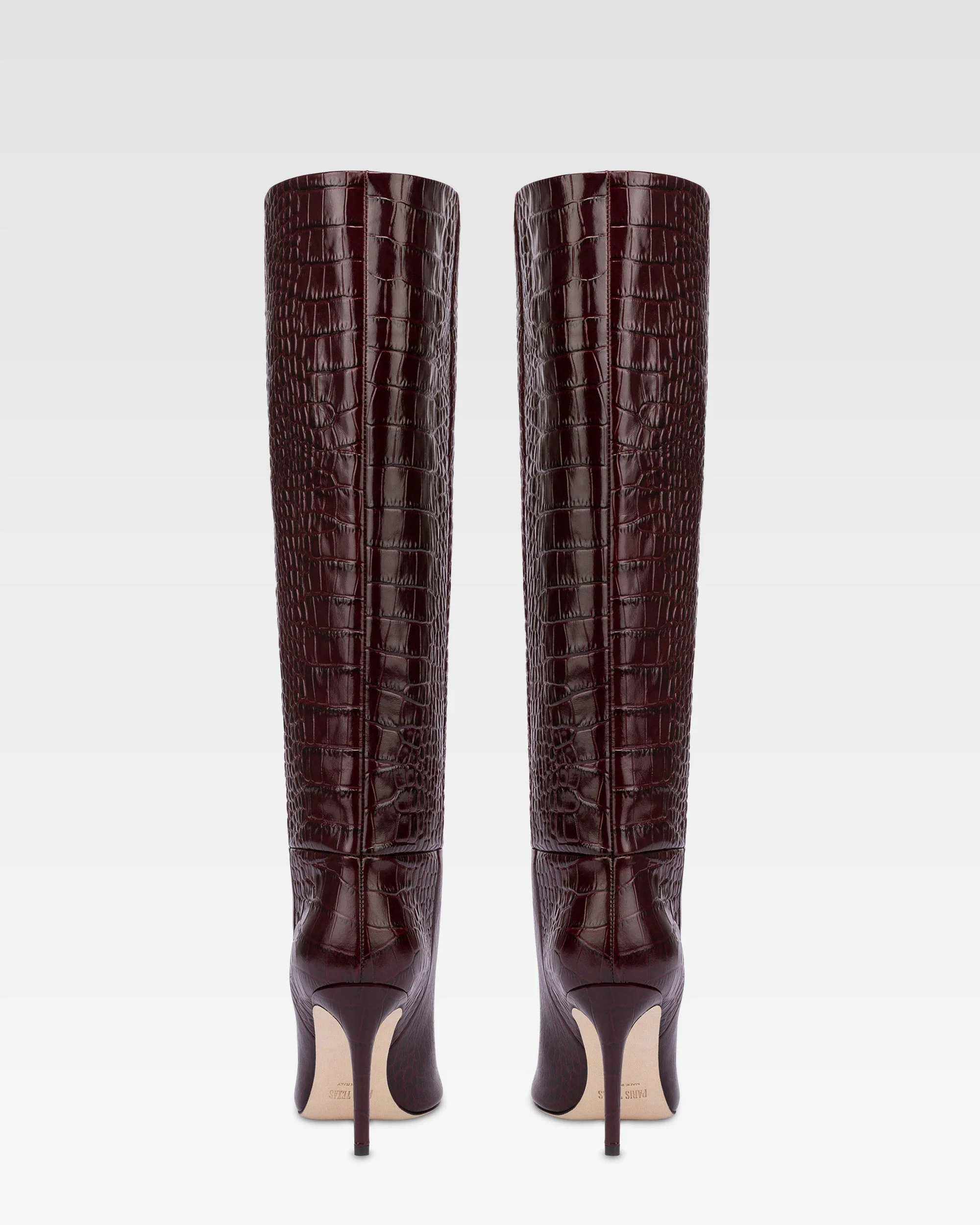 Pointed knee-high boots in rouge noir soft croco-embossed leather