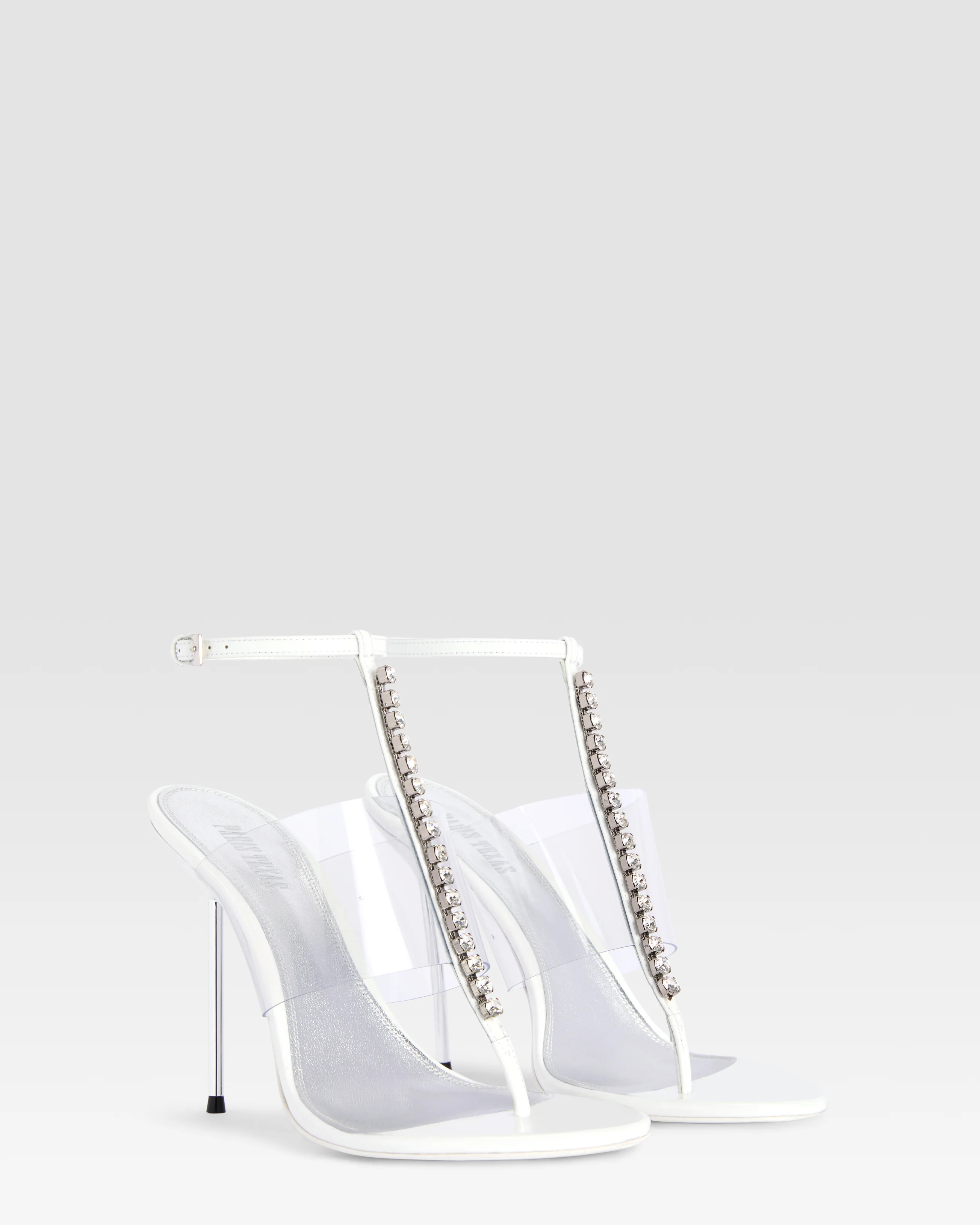 T-strap sandals in optic white patent leather with stud detailing