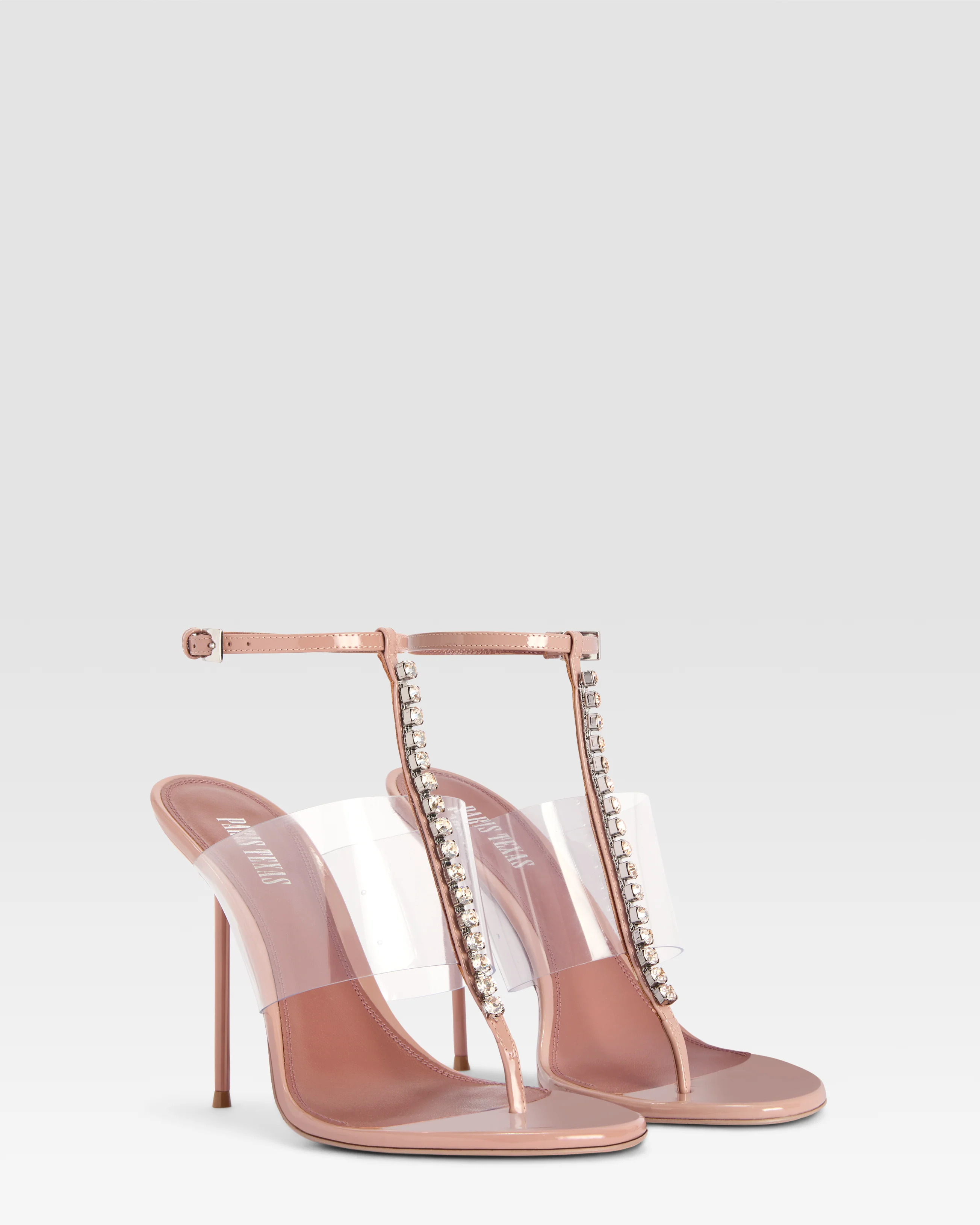 T-strap sandals in Texas rose patent leather with stud detailing