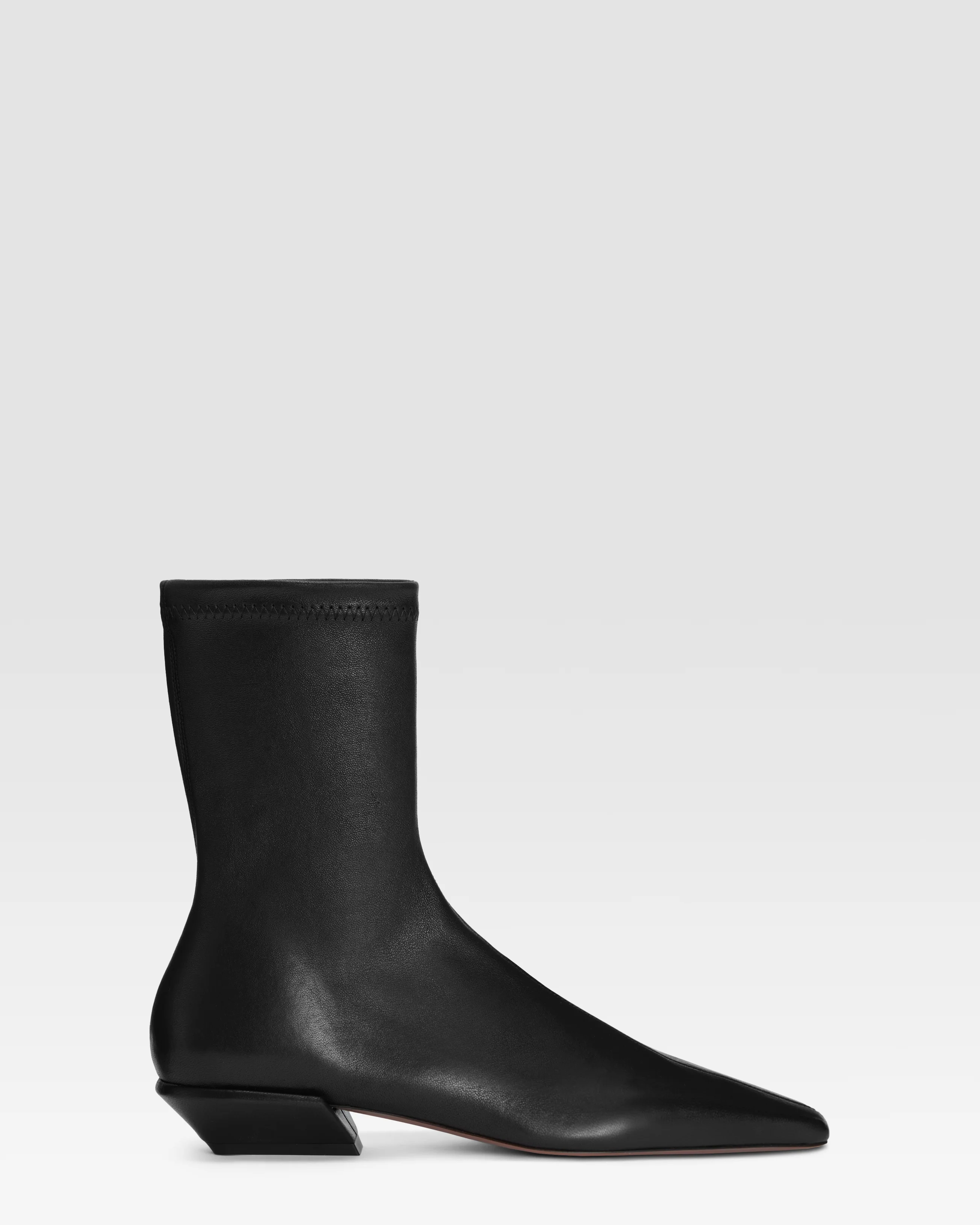 Ankle boots in black stretch leather