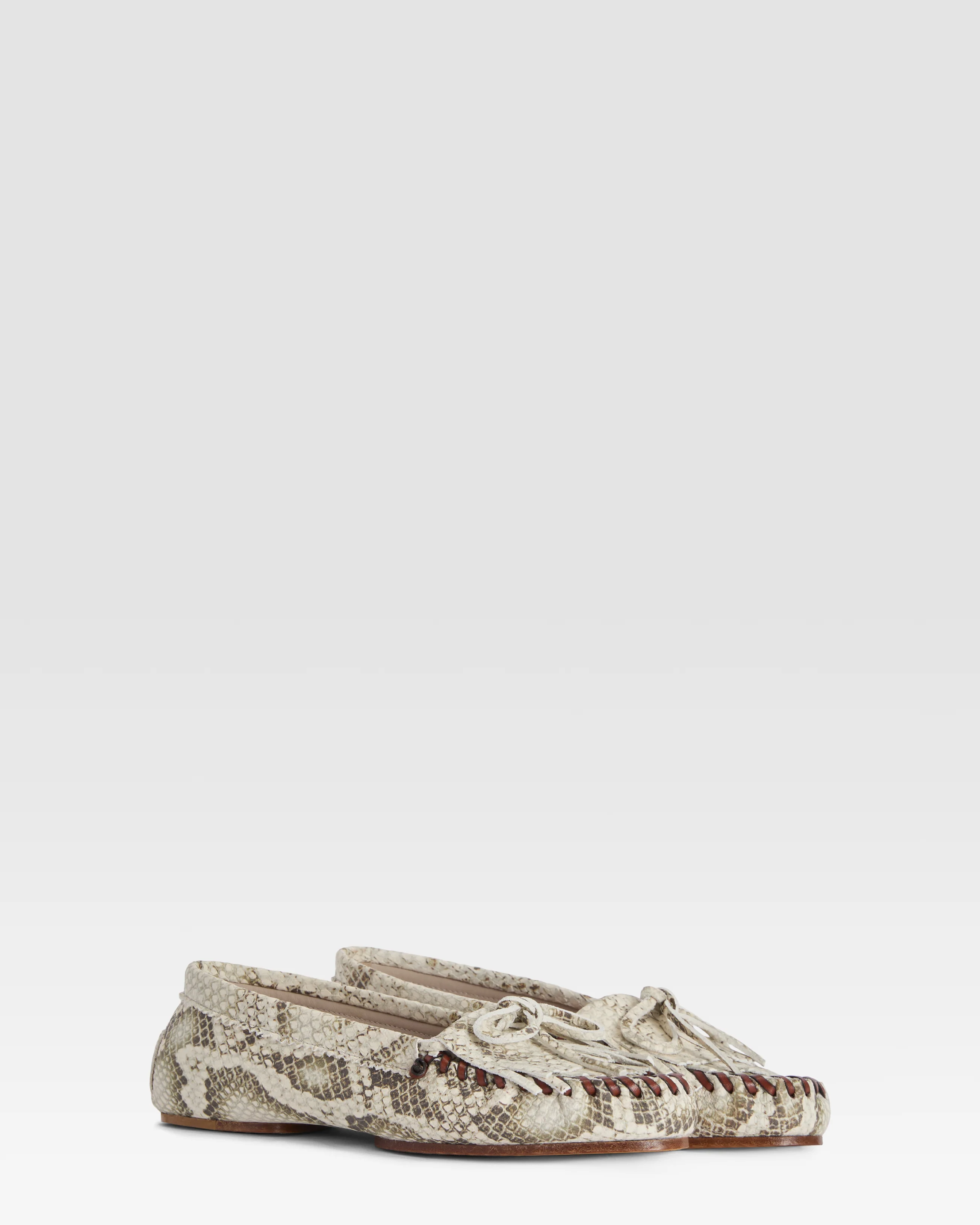 Loafers in natural printed python leather