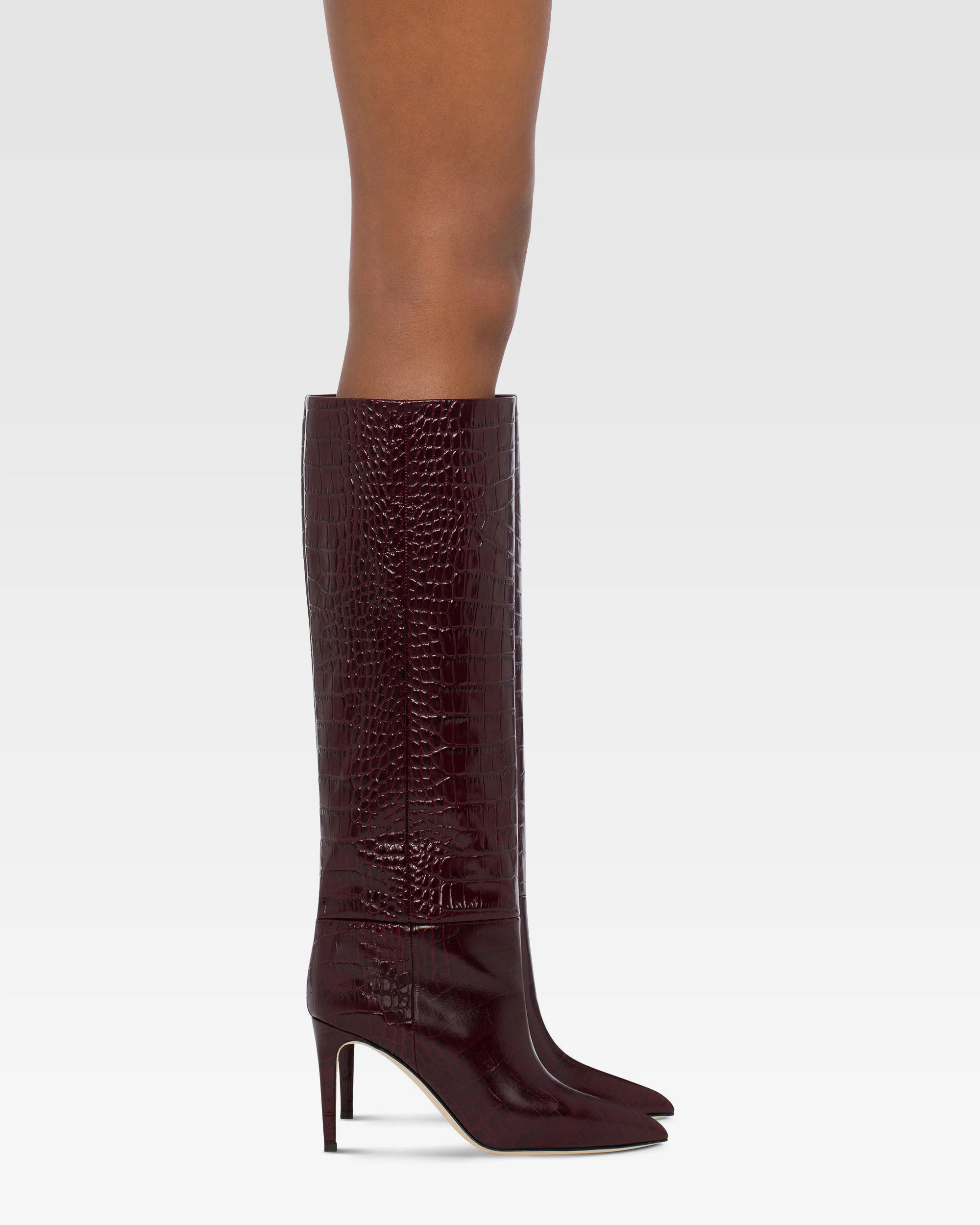 Pointed knee-high boots in rouge noir soft croco-embossed leather