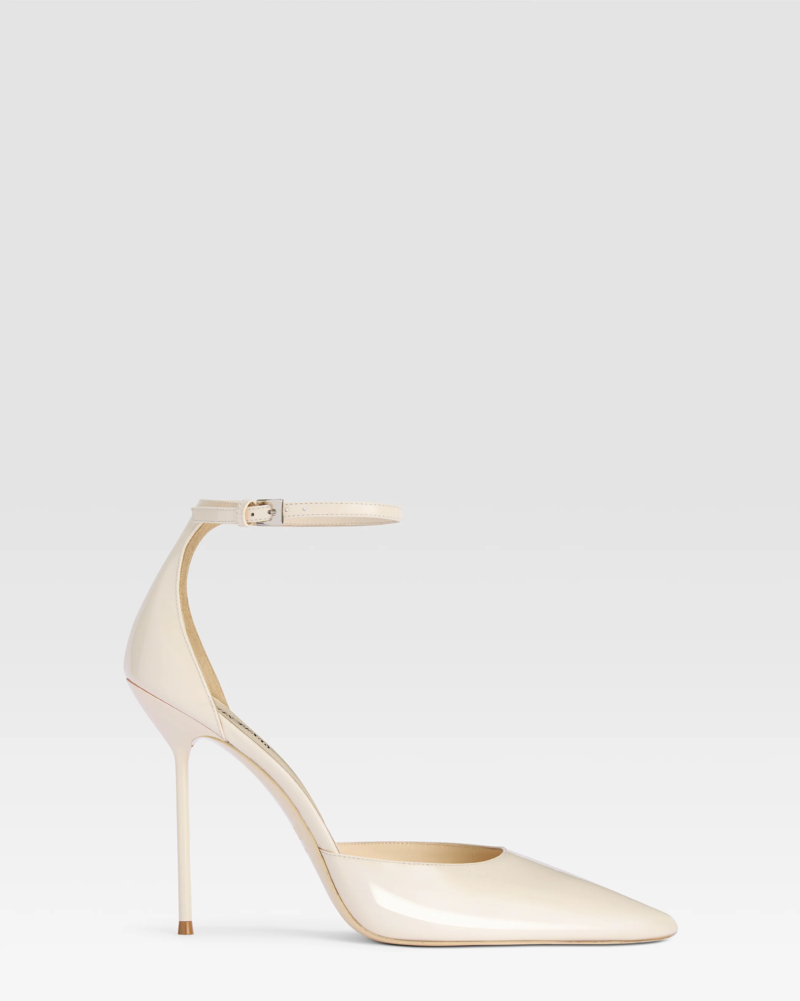 Ankle-strap pumps in ivory patent leather