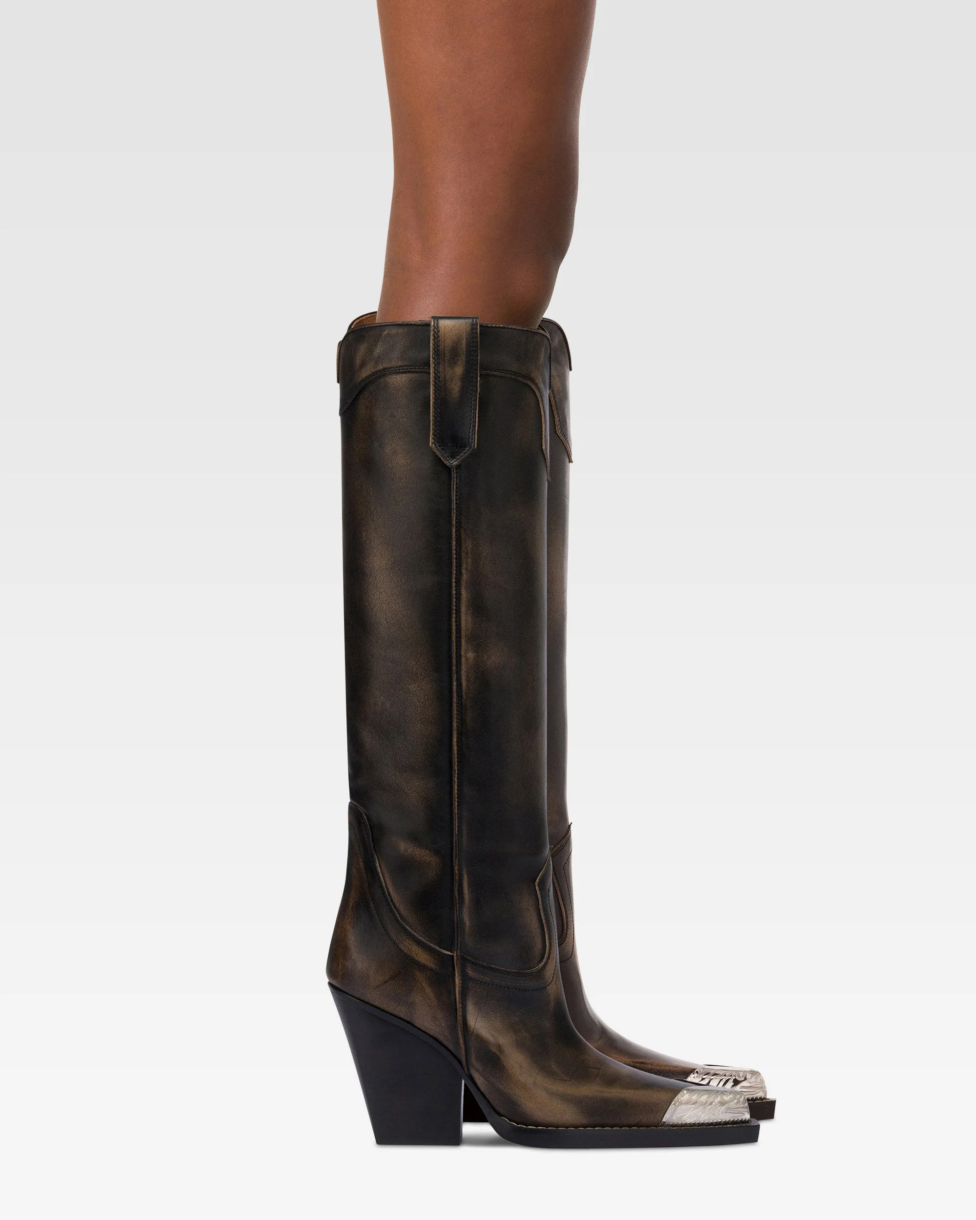 Texan-style boots in black brushed leather.