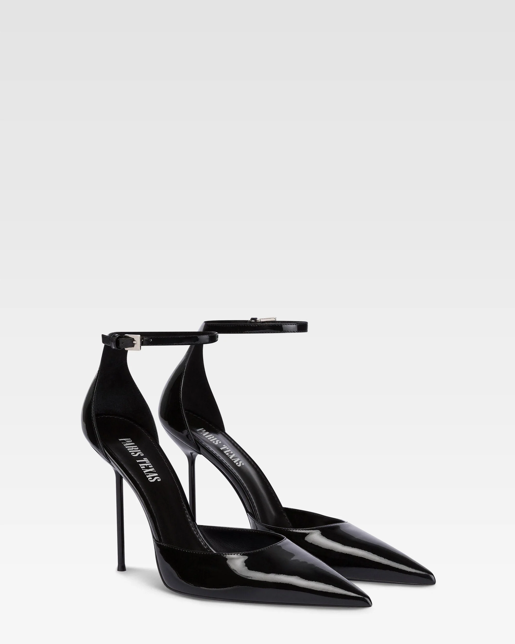 Ankle-strap pumps in black patent leather