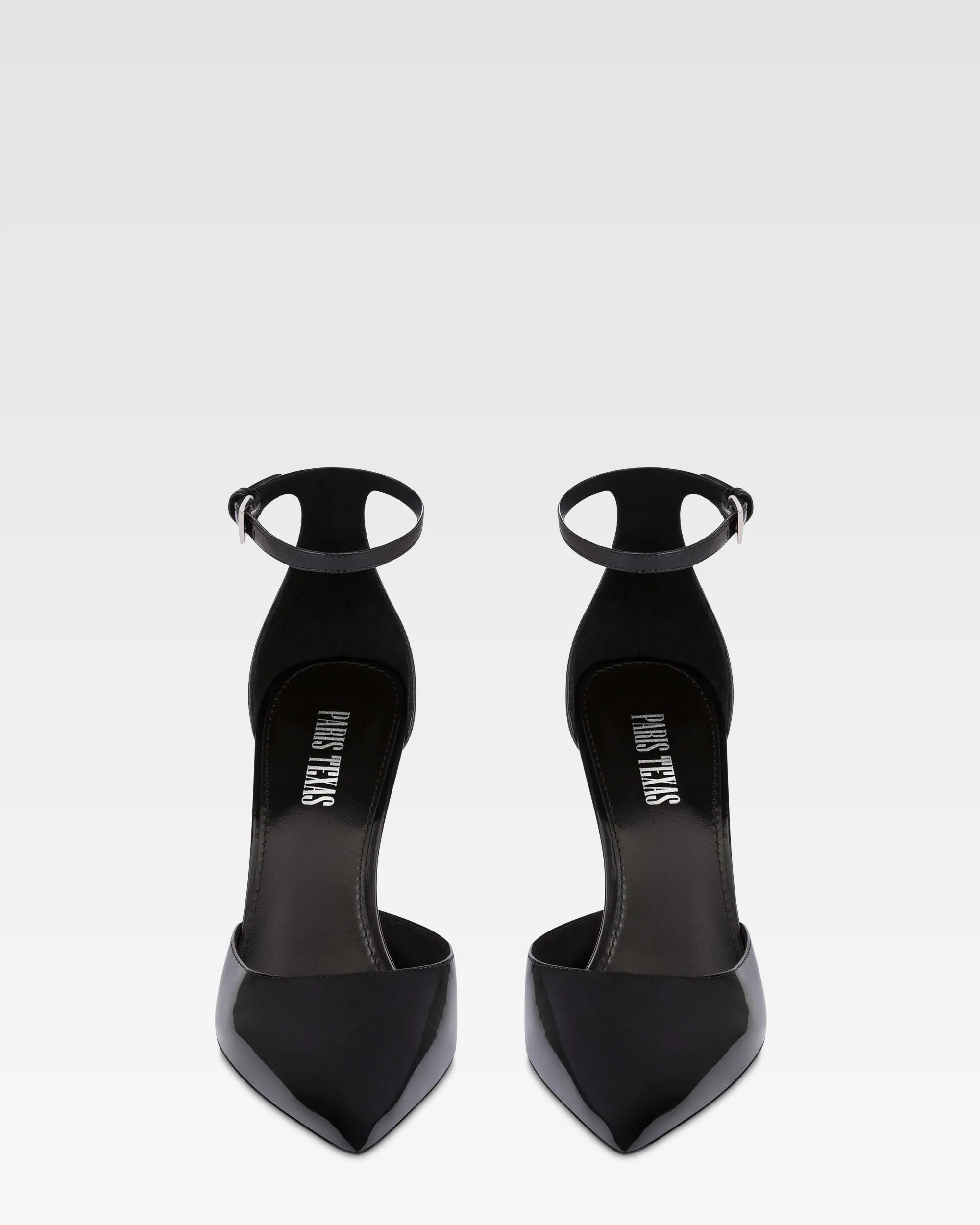 Ankle-strap pumps in black patent leather
