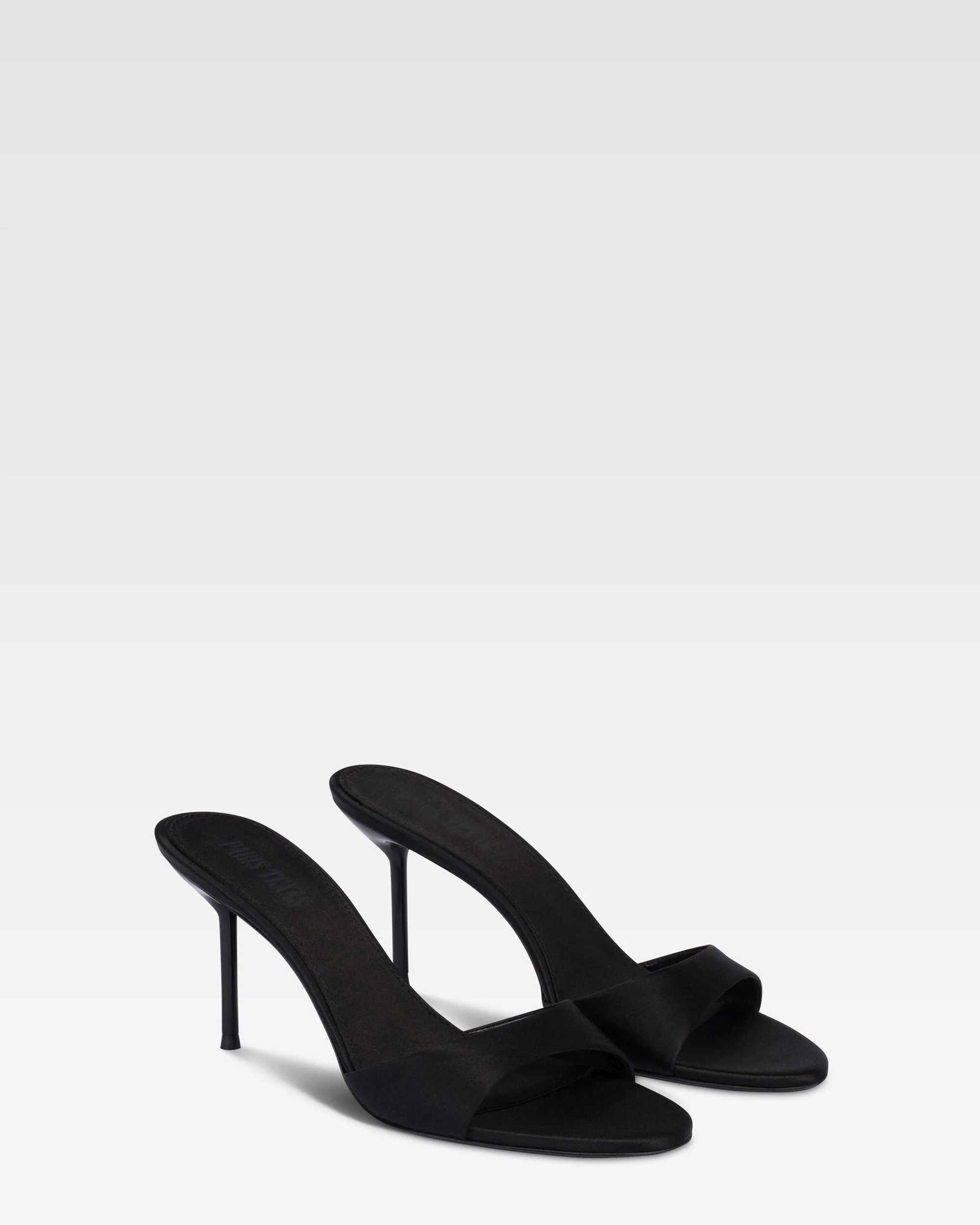 Mules in black satin.