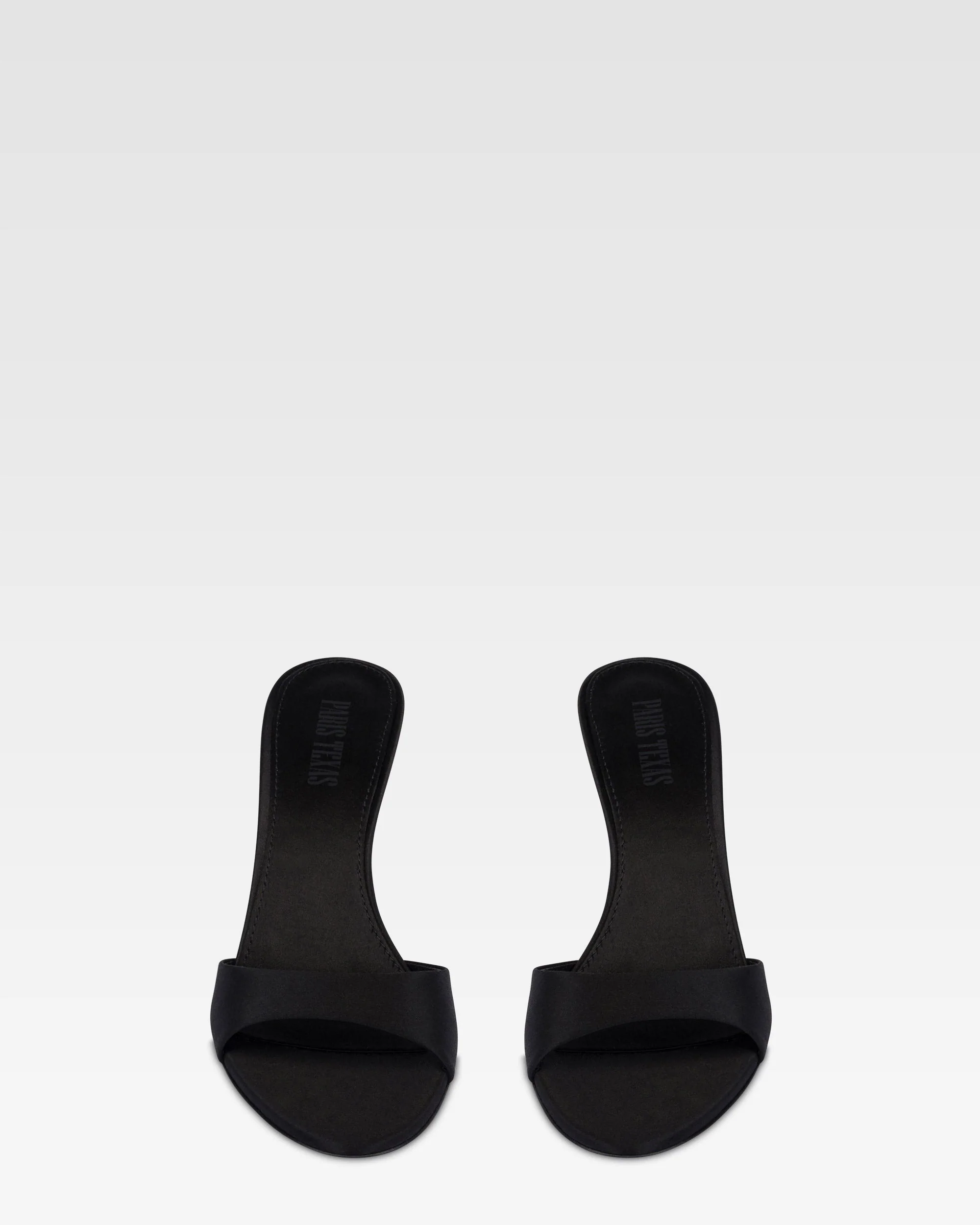 Mules in black satin.