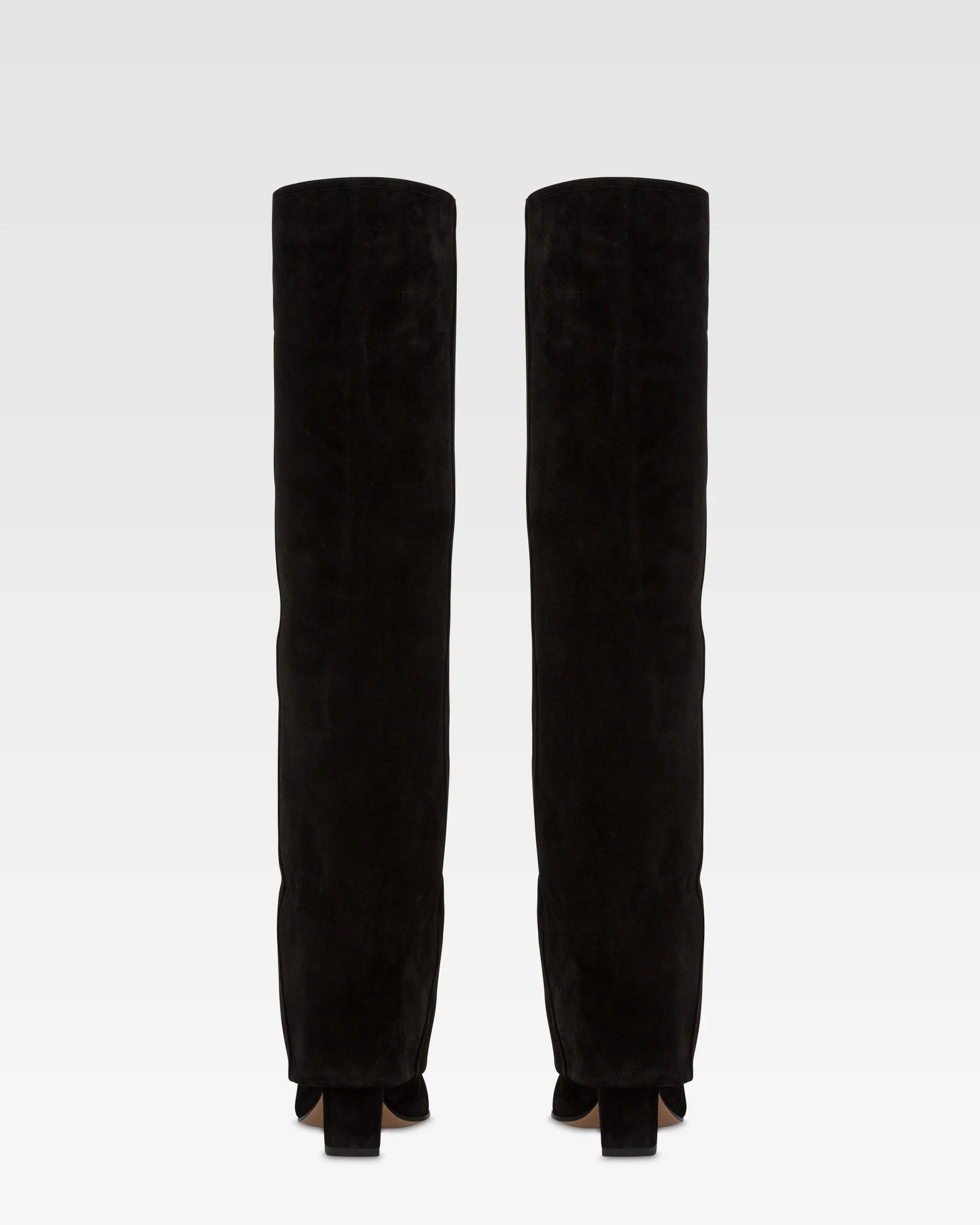 Fold-over boots in black calf suede leather. 4 Fold-over boots in black calf suede leather.