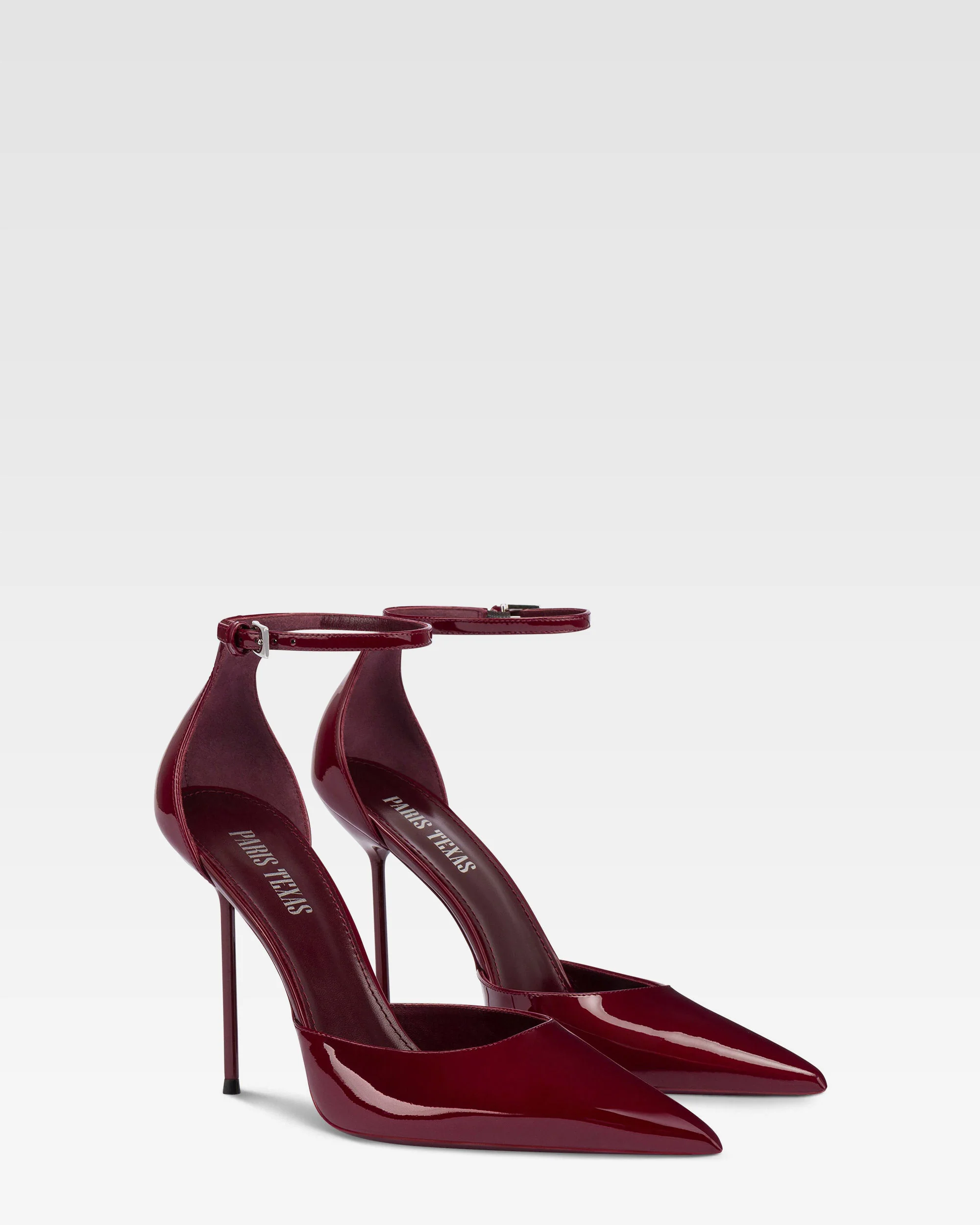 Ankle-strap pumps in rouge noir patent leather