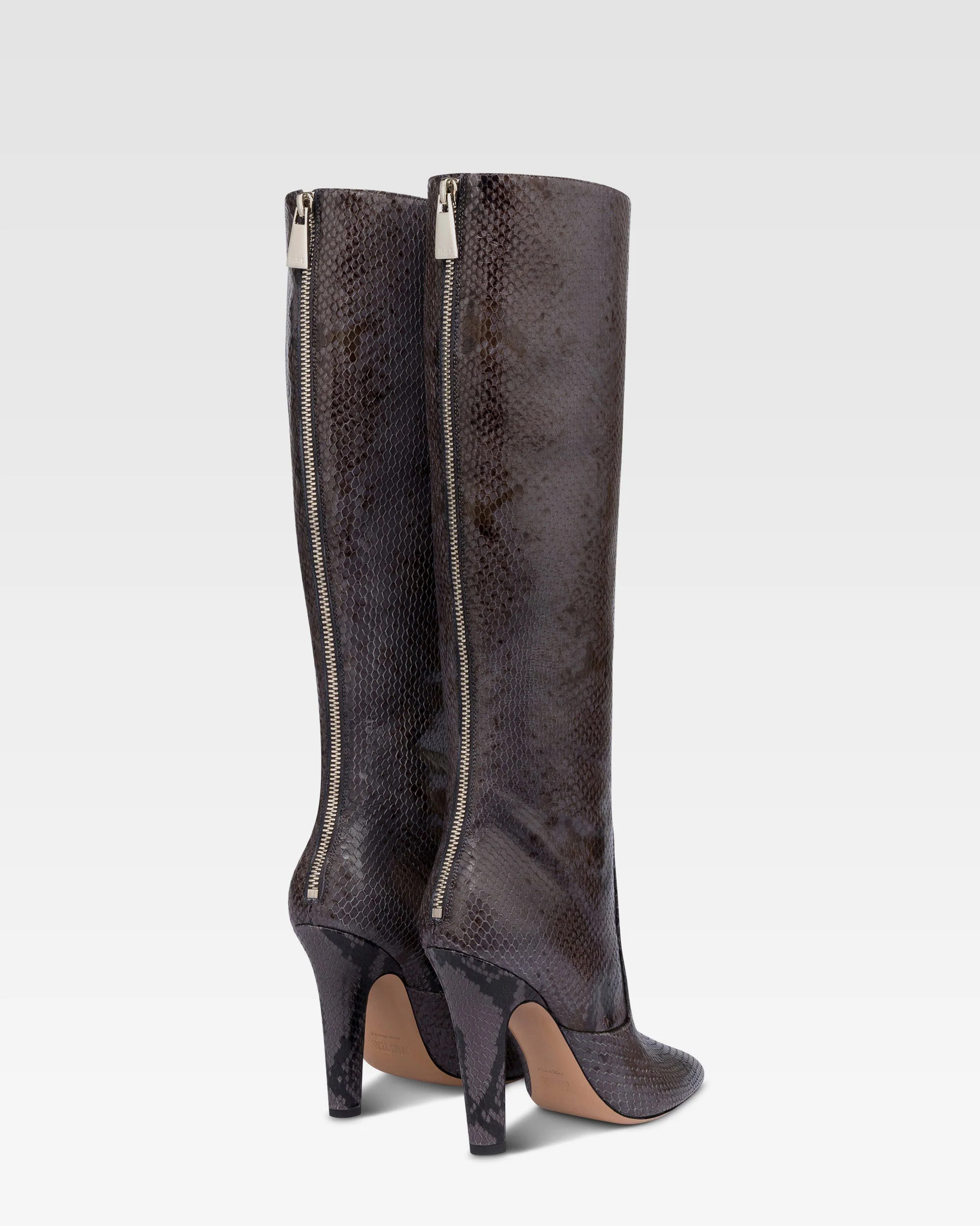 Boots in ash printed python leather. 3 Boots in ash printed python leather.