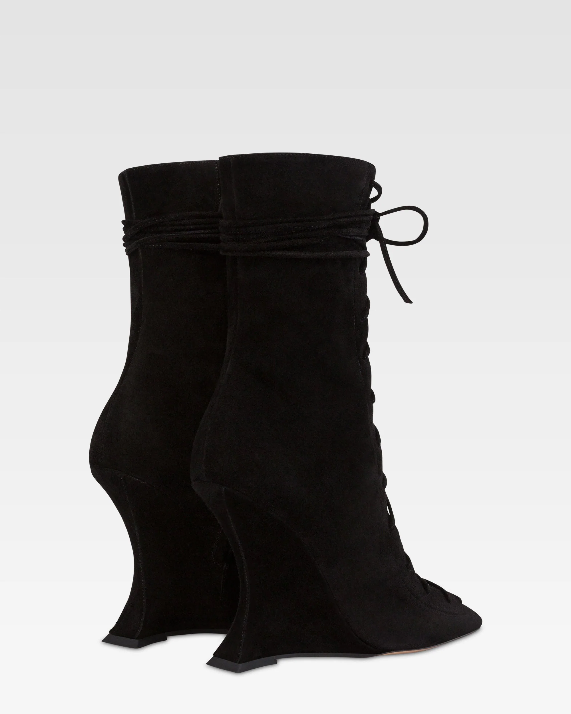 Ankle boots in black calf suede leather.